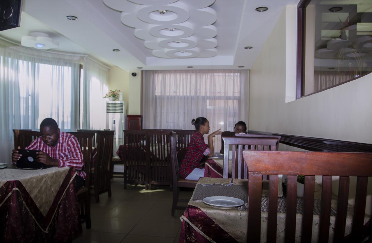 Rising Sun Hotel Darüsselam Dış mekan fotoğraf